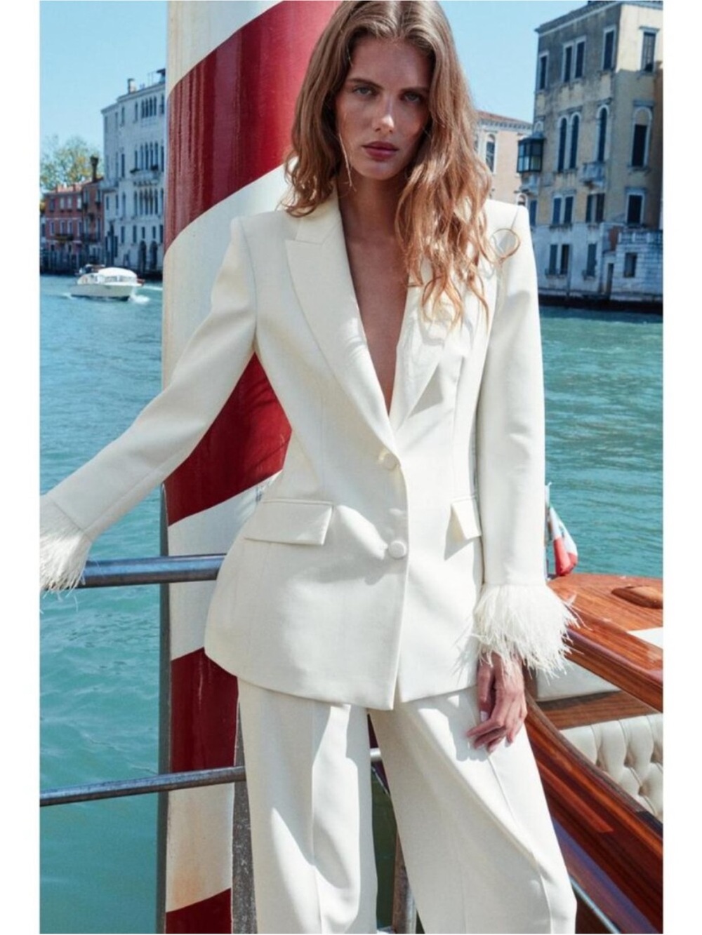 BLAZER WITH SHOULDER PADS AND FEATHER CUFFS